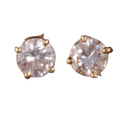 Lot 255 - A pair of diamond stud earrings.