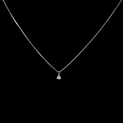 Lot 285 - A diamond solitaire pendant on a chain.