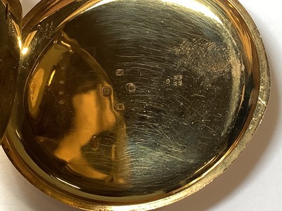Lot 1068 - T S Cogdon & Son - an 18 carat yellow gold full hunter pocket watch.