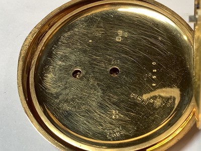 Lot 1068 - T S Cogdon & Son - an 18 carat yellow gold full hunter pocket watch.