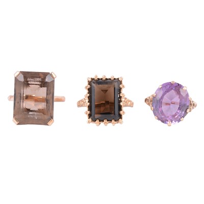 Lot 56 - Three vintage dress rings, smoky quartz, amethyst.