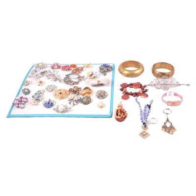 Lot 488 - A collection of costume jewellery bangles, bracelets, brooches, earrings and handmade keyrings.