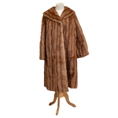 Lot 1229 - Two full length fur coats.