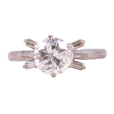 Lot 66 - A diamond solitaire ring.