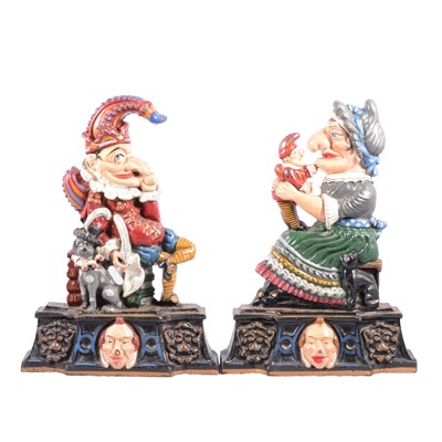 Lot 104 - Pair of painted cast iron doorstops, Mr Punch and Judy