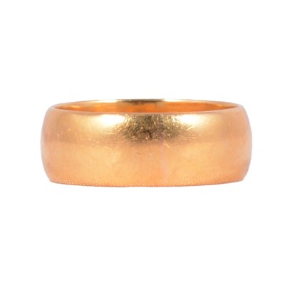 Lot 143 - A 22 carat gold wedding band.