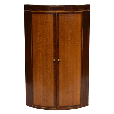 Lot 312 - George III oak and mahogany cylinder front hanging corner cupboard