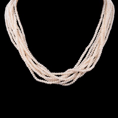 Lot 379 - An eight strand pearl necklace.