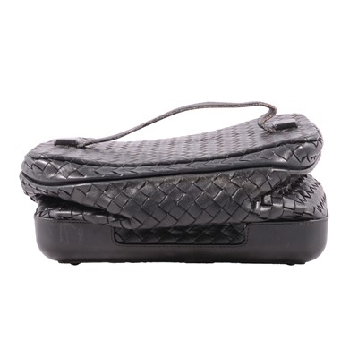 Lot 1246 - Bottega Veneta - a black leather woven cosmetic bag.