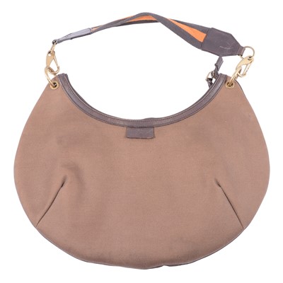 Lot 1240 - Gucci - a brown fabric Hobo handbag.