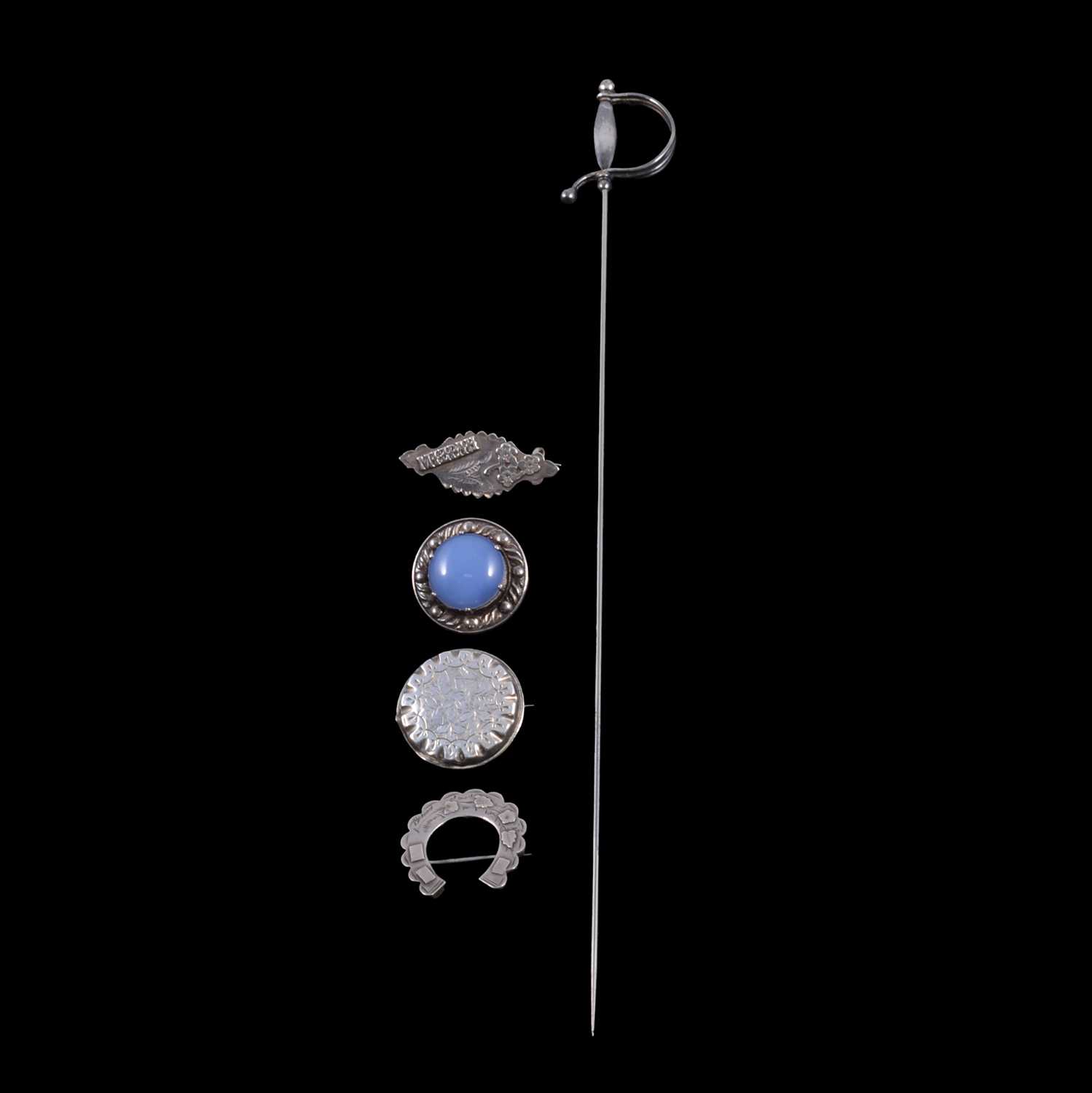 Lot 472 - A Charles Horner hatpin, and four brooches.