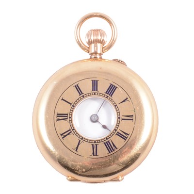 Lot 1073A - An 18K half hunter fob watch.