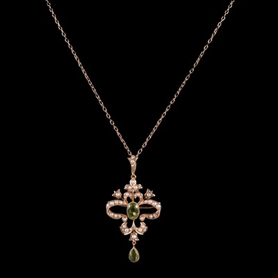 Lot 302A - An Edwardian peridot and pearl brooch/pendant and chain.