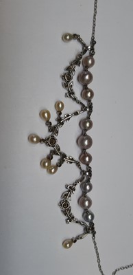Lot 280 - A pearl and diamond necklace and similar bar brooch.