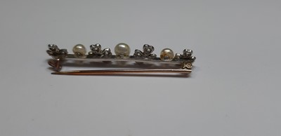 Lot 280 - A pearl and diamond necklace and similar bar brooch.