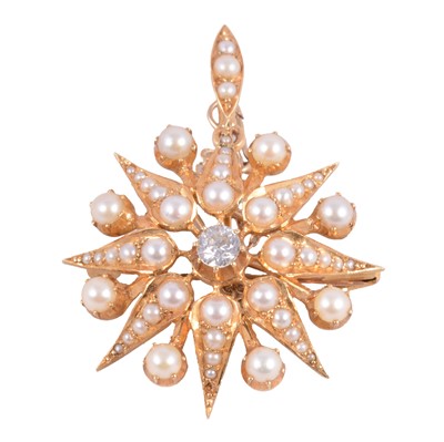 Lot 192A - A pearl and diamond star design brooch/pendant.