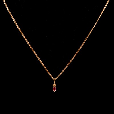 Lot 293A - A modern ruby and diamond pendant and chain.