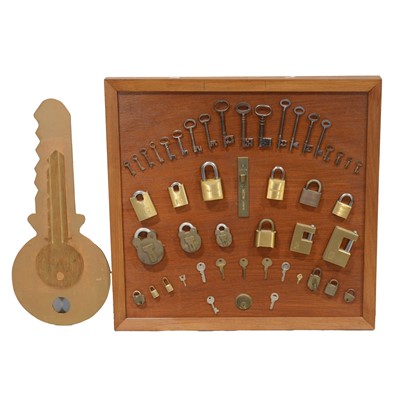 Lot 114 - A Locksmith's display arrangement, and Key-shaped sign