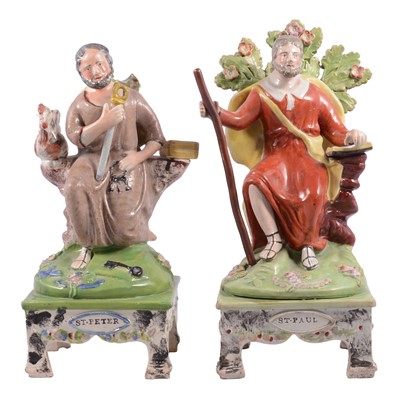 Lot 8 - Two Staffordshire earthenware figures St. Peter and St. Paul