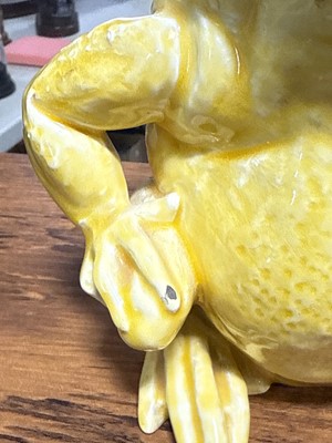Lot 377 - Two Bretby style Art Pottery frogs, a Clement Massier type majolica frog, duck, two jugs and Worcester fish jug