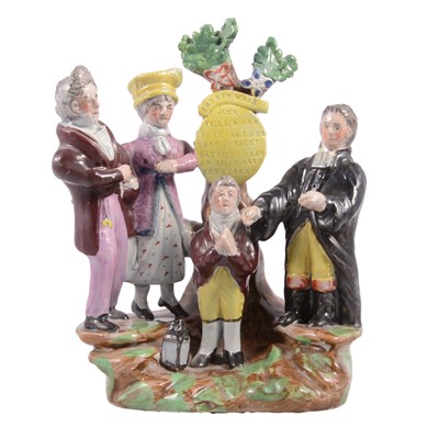 Lot 15 - Staffordshire earthenware group of the New Marriage Act