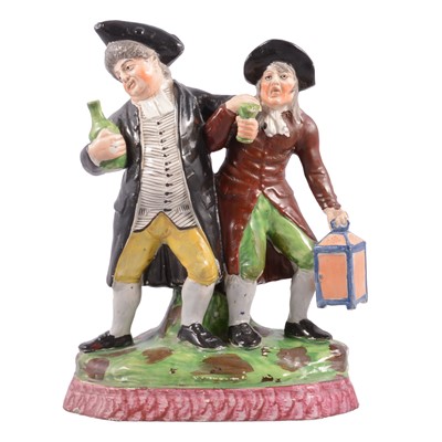 Lot 26 - Staffordshire earthenware group, Drunken Revellers