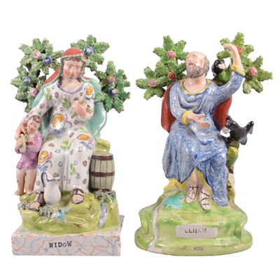 Lot 28 - Two Staffordshire figures, Elijah and the Widow of Zarephath