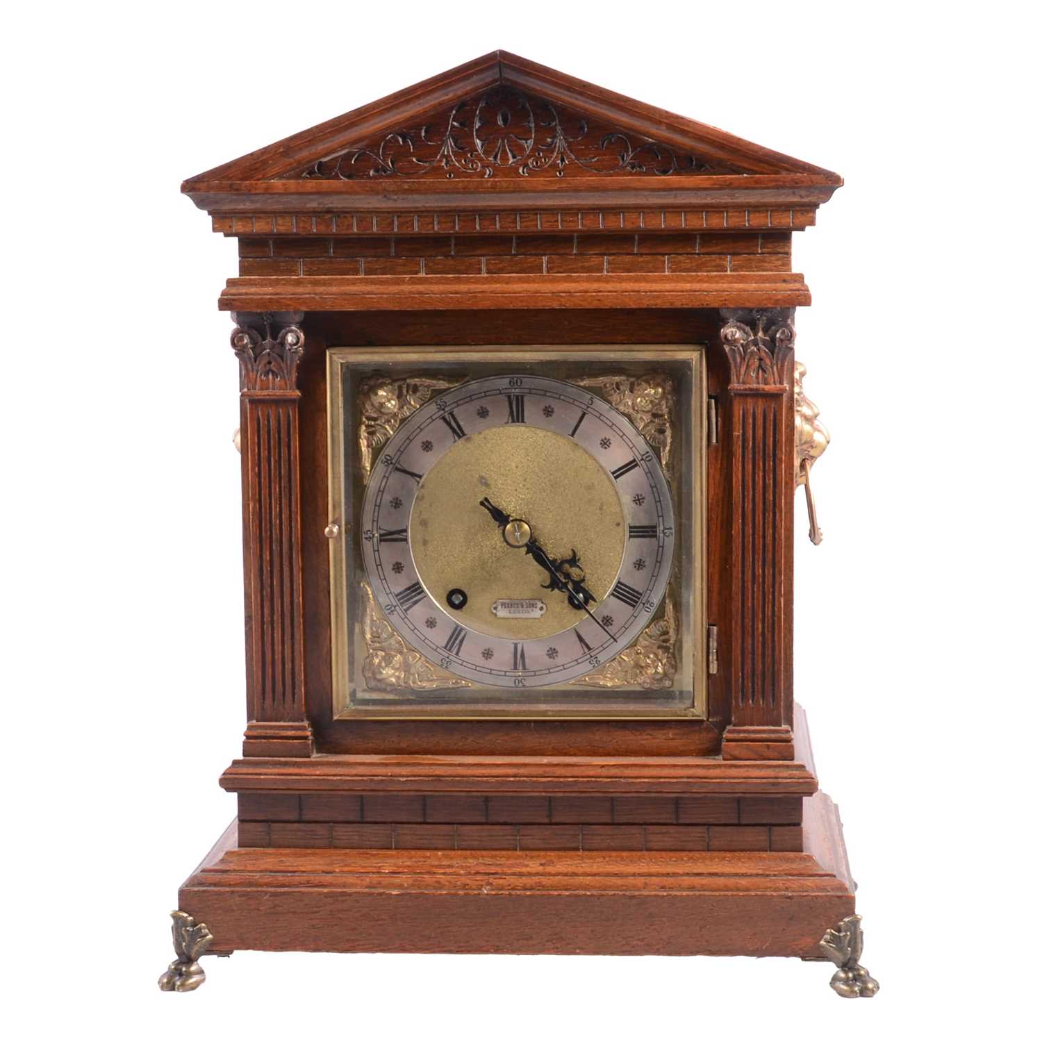 Lot 205 - Edwardian oak table clock