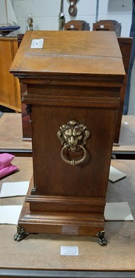 Lot 205 - Edwardian oak table clock