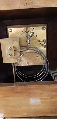 Lot 205 - Edwardian oak table clock