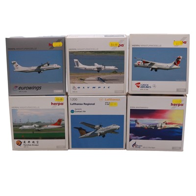 Lot 136 - Eleven Herpa propeller model aircraft. boxed