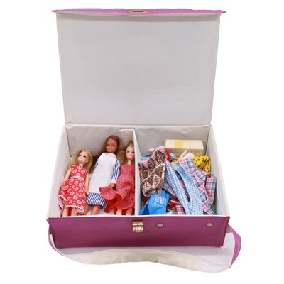 Lot 272 - Three Pippa dolls, clothing, accessories and carry case