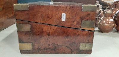 Lot 107 - Victorian walnut writing slope with brass mounts