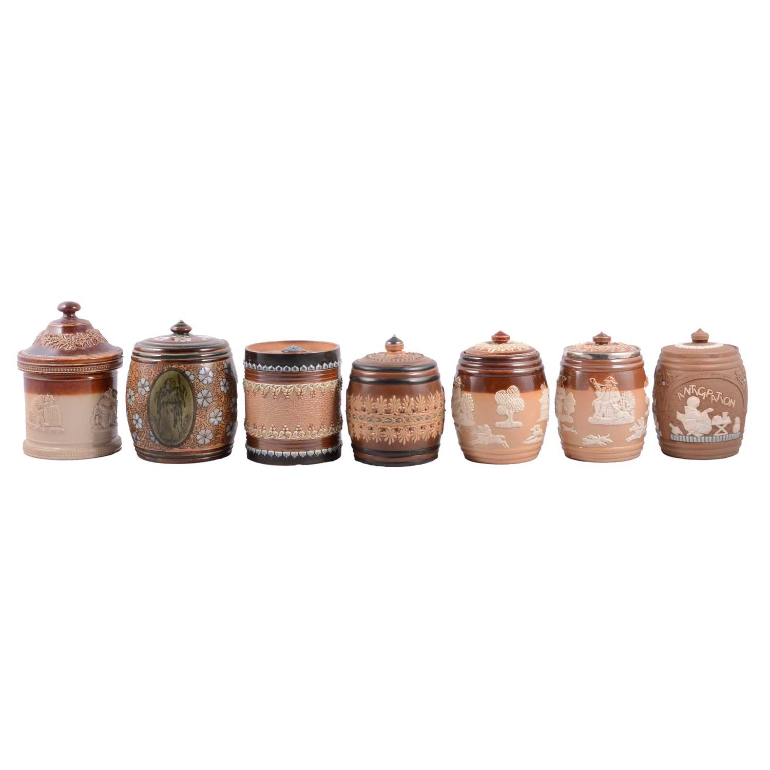 Lot 16 - Collection of seven Doulton Lambeth stoneware Tobacco jars