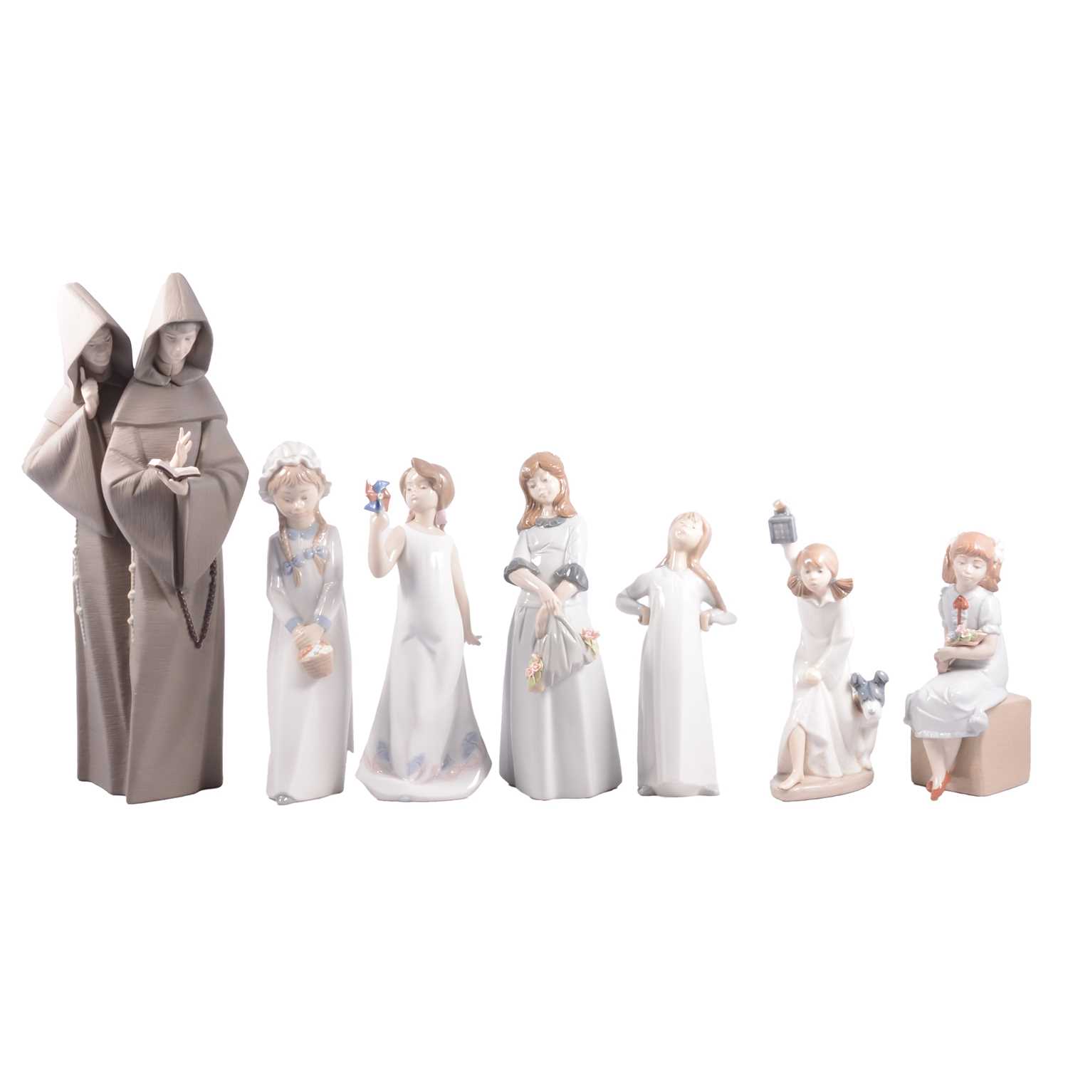 Lot 16 - Seven Lladro, Nao, Nadal and Zaphir figurines.