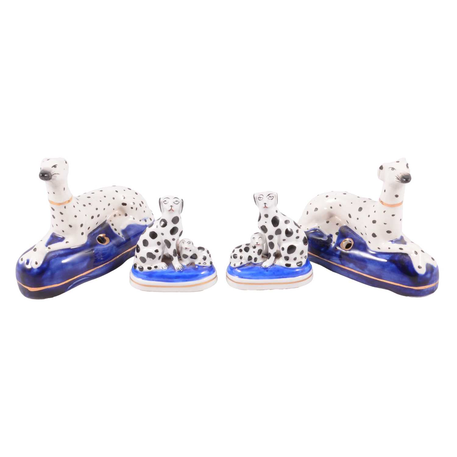 Lot 4 - Pair of Staffordshire dog pen stands, and another pair of smaller dalmation dogs