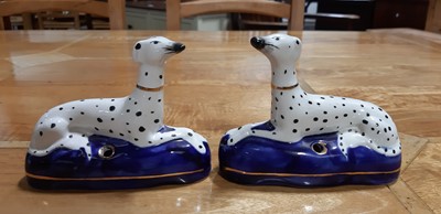 Lot 4 - Pair of Staffordshire dog pen stands, and another pair of smaller dalmation dogs