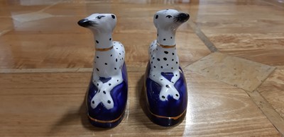 Lot 4 - Pair of Staffordshire dog pen stands, and another pair of smaller dalmation dogs