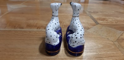 Lot 4 - Pair of Staffordshire dog pen stands, and another pair of smaller dalmation dogs