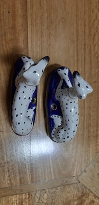 Lot 4 - Pair of Staffordshire dog pen stands, and another pair of smaller dalmation dogs