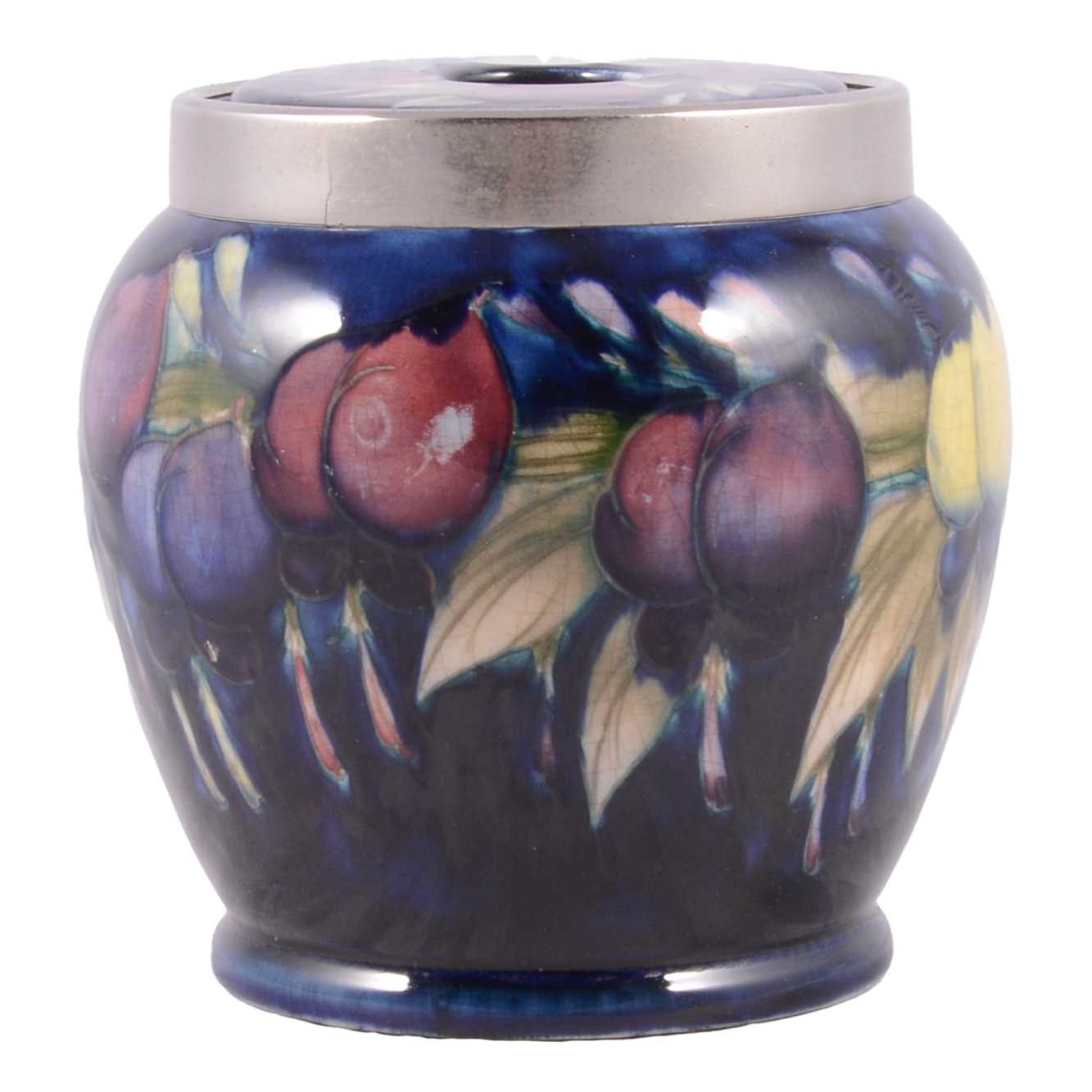Lot 49 - Moorcroft Pottery, a 'Wisteria' pattern jar and cover / string box, 1920s