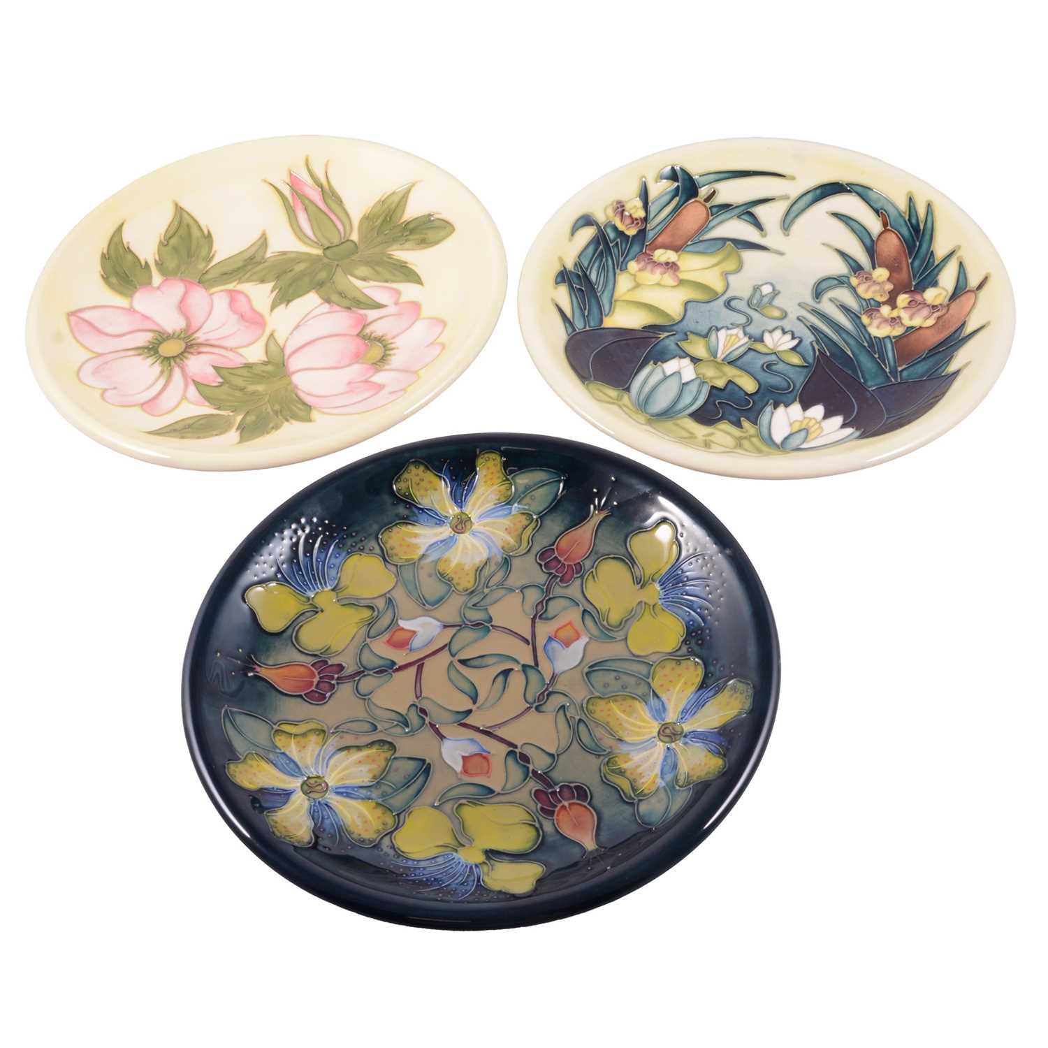 Lot 53 - Moorcroft Pottery, three large wall plates, 1980s/90s