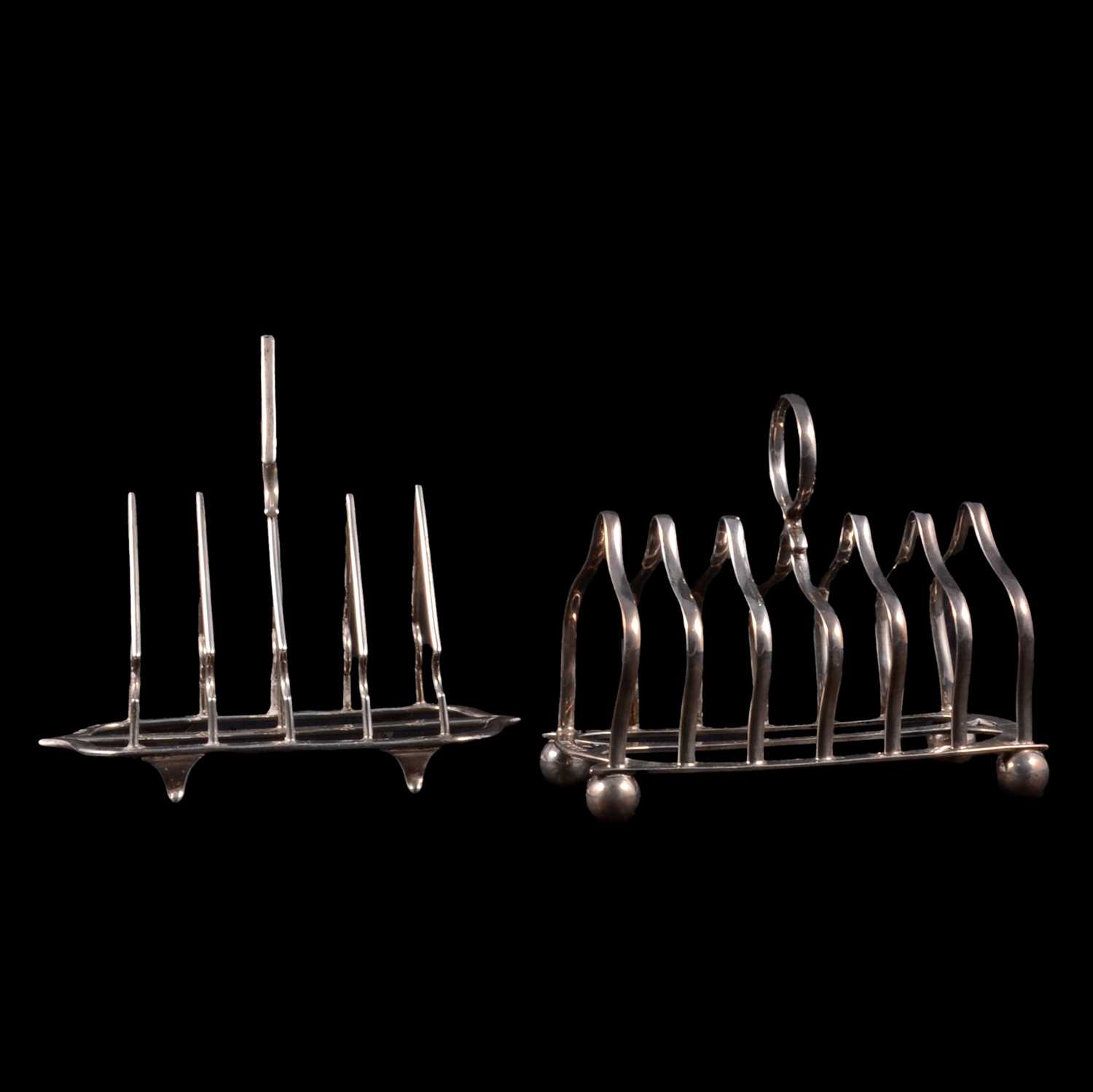 Lot 169 - Two silver toast racks