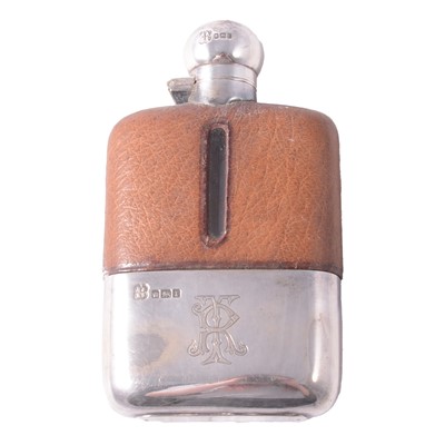 Lot 200 - Silver-mounted, glass and leather-covered hip flask, R & W Sorley, Sheffield 1909.