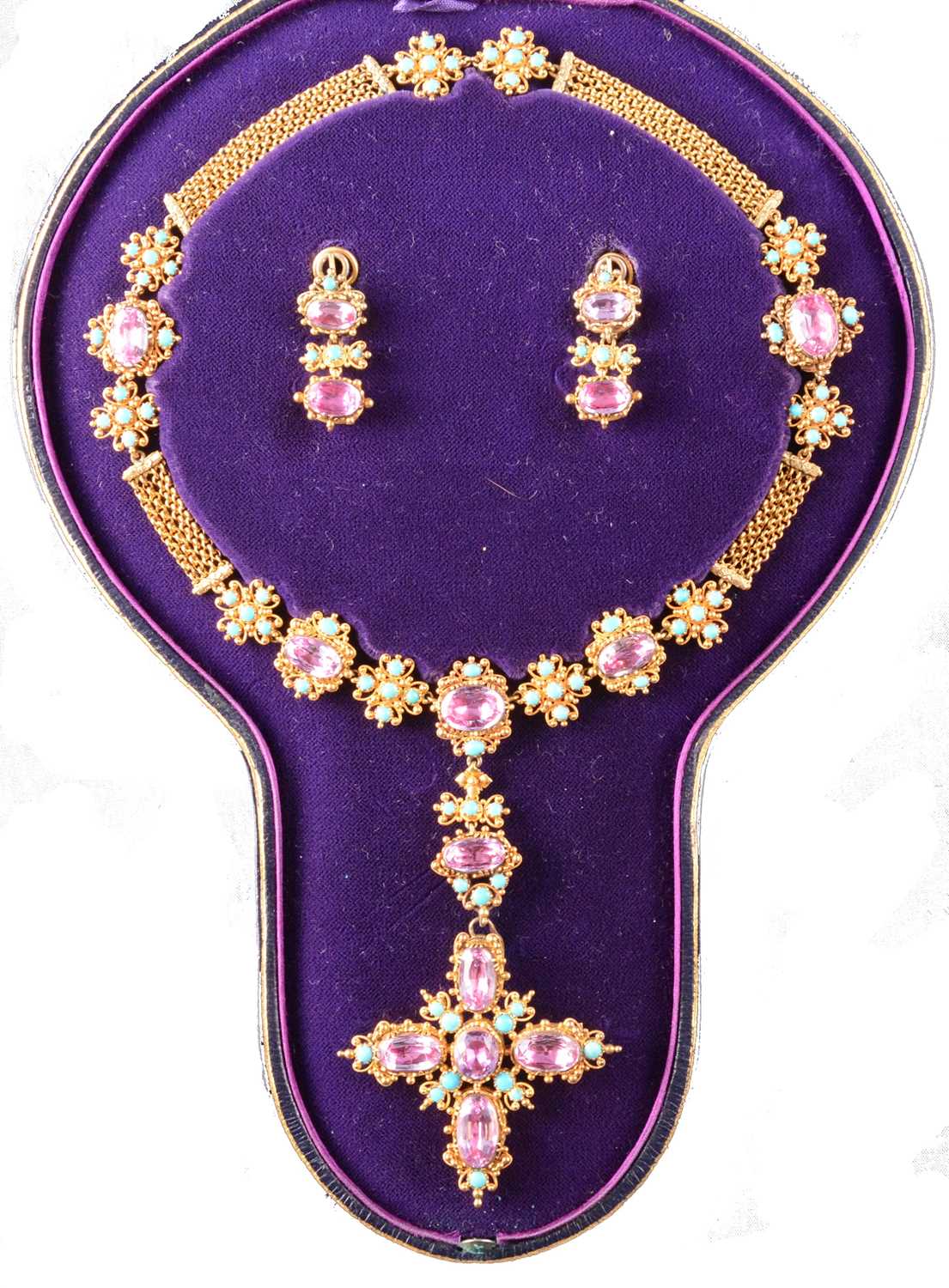 Lot 247 - A 19TH century foil back pink topaz and turquoise parure in fitted N Bloom & Sons box.