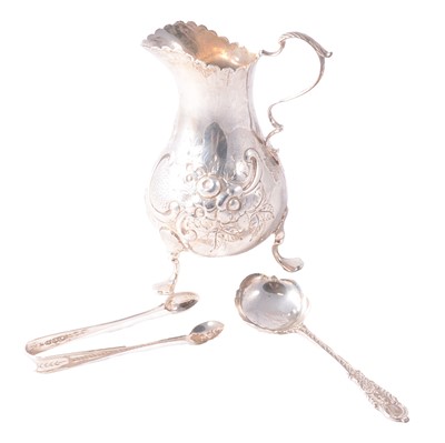 Lot 230 - Victorian silver milk jug, H J Lias & Son, London 1867, pair of sugar nips, and white metal spoon.