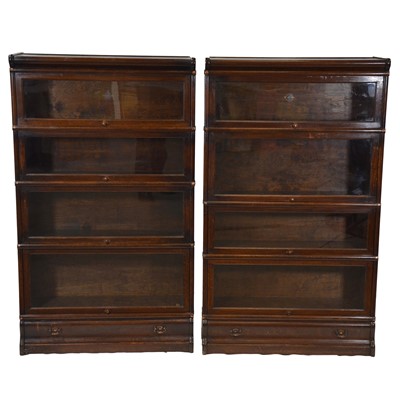 Lot 347 - Pair of Globe-Wernicke oak sectional bookcases
