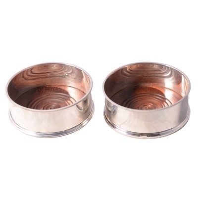 Lot 236 - Pair of modern silver bottle coasters, John & Maureen Surtees, London 1987.