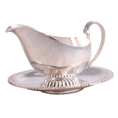 Lot 134 - Arts & Crafts silver sauceboat on stand