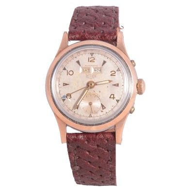 Lot 1181 - Tag Heuer - a Triple Date wristwatch